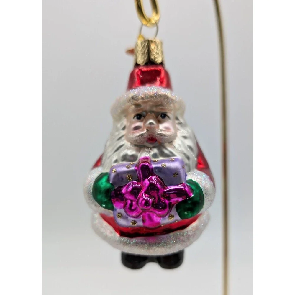 OLD WORLD CHRISTMAS Blown Glass Santa Claus Holding Gift Ornament 4